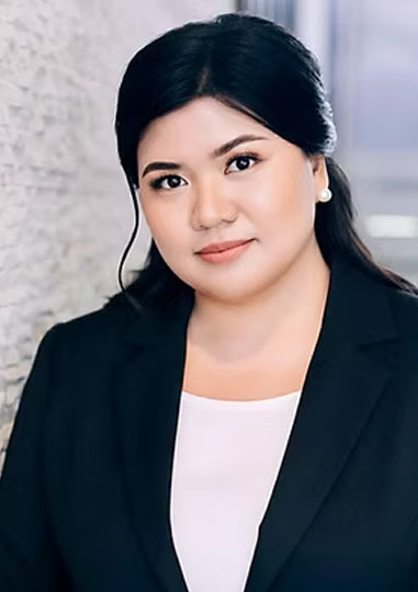 Headshot of Christine Joy Valenciano in a black blazer