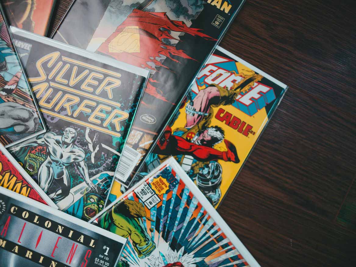 Pile of vintage comic books including Silver Surfer